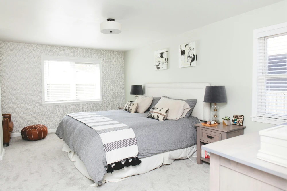 A beautiful white bedroom setting.